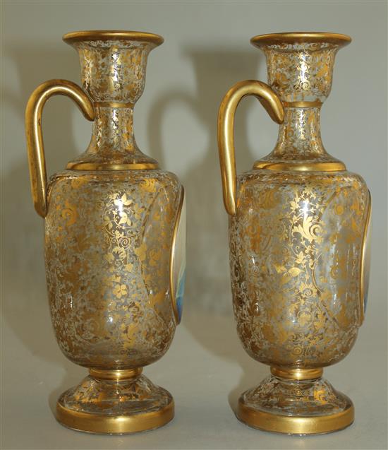A pair of Bohemian enamelled and gilt decorated glass ewers, late 19th century, 20.5cm